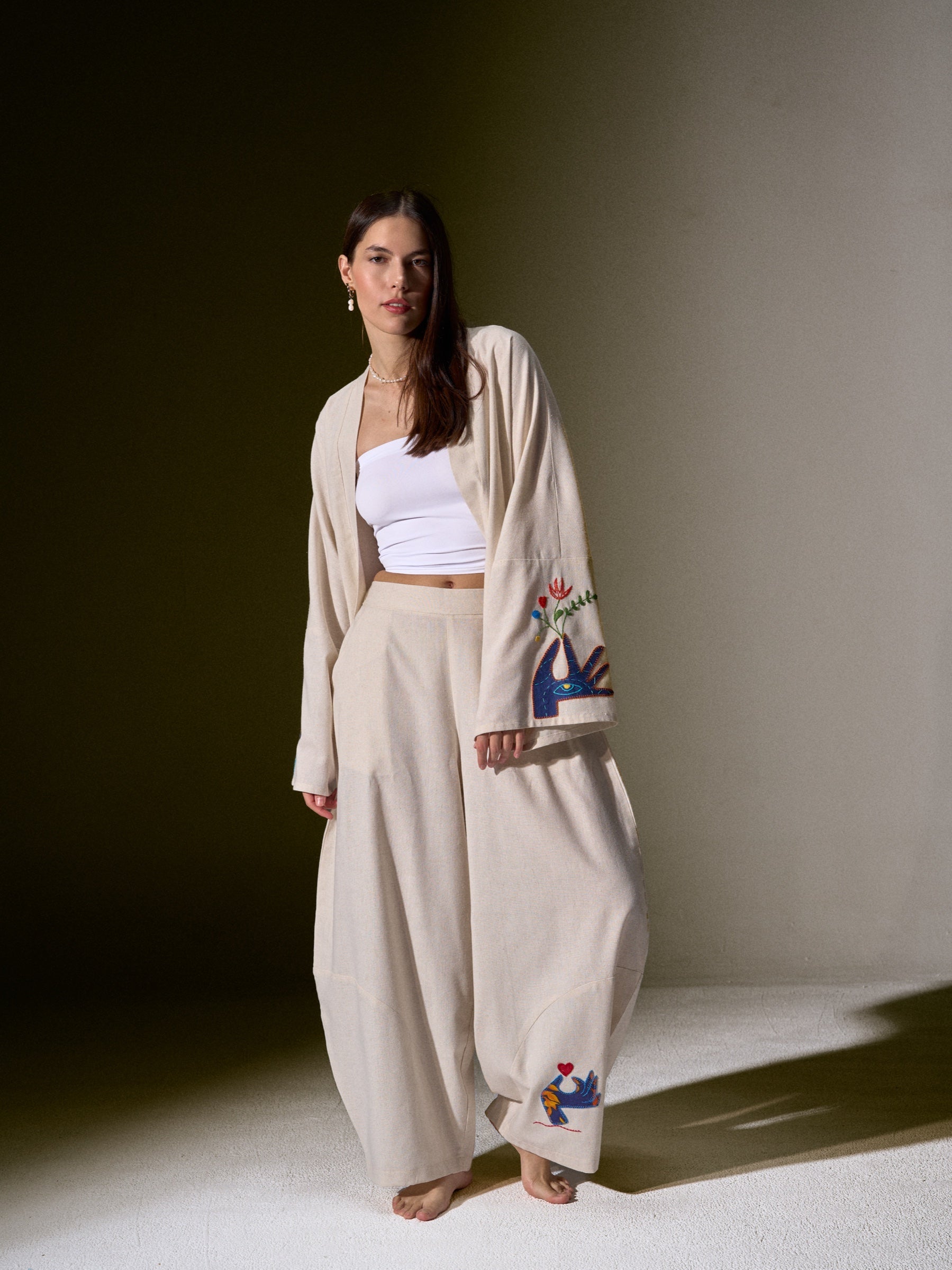 Set 8 from Stories in Motion with hand-embroidered sleeves and trouser hem